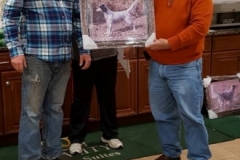 Bill Phelps receiving the Club Championship portrait for Daisy from Bill Butler and Tim Powell — with Timothy Powell and Harry Lyness.